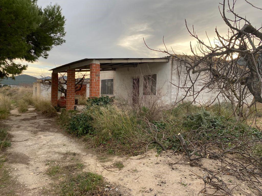 Terreno y casa
